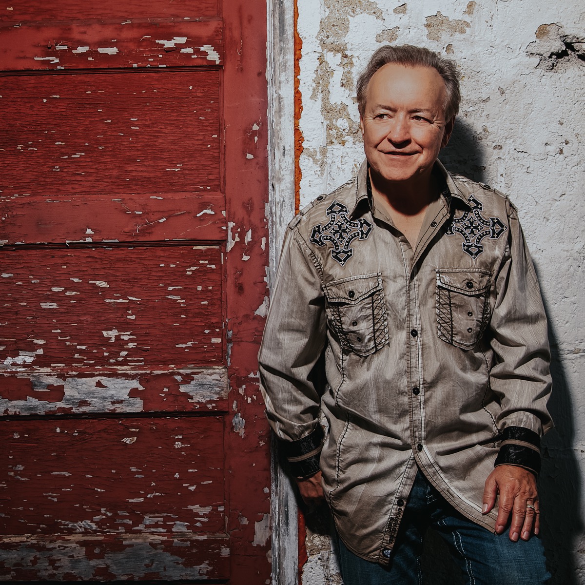 Bobby G. Rice portrait by red door